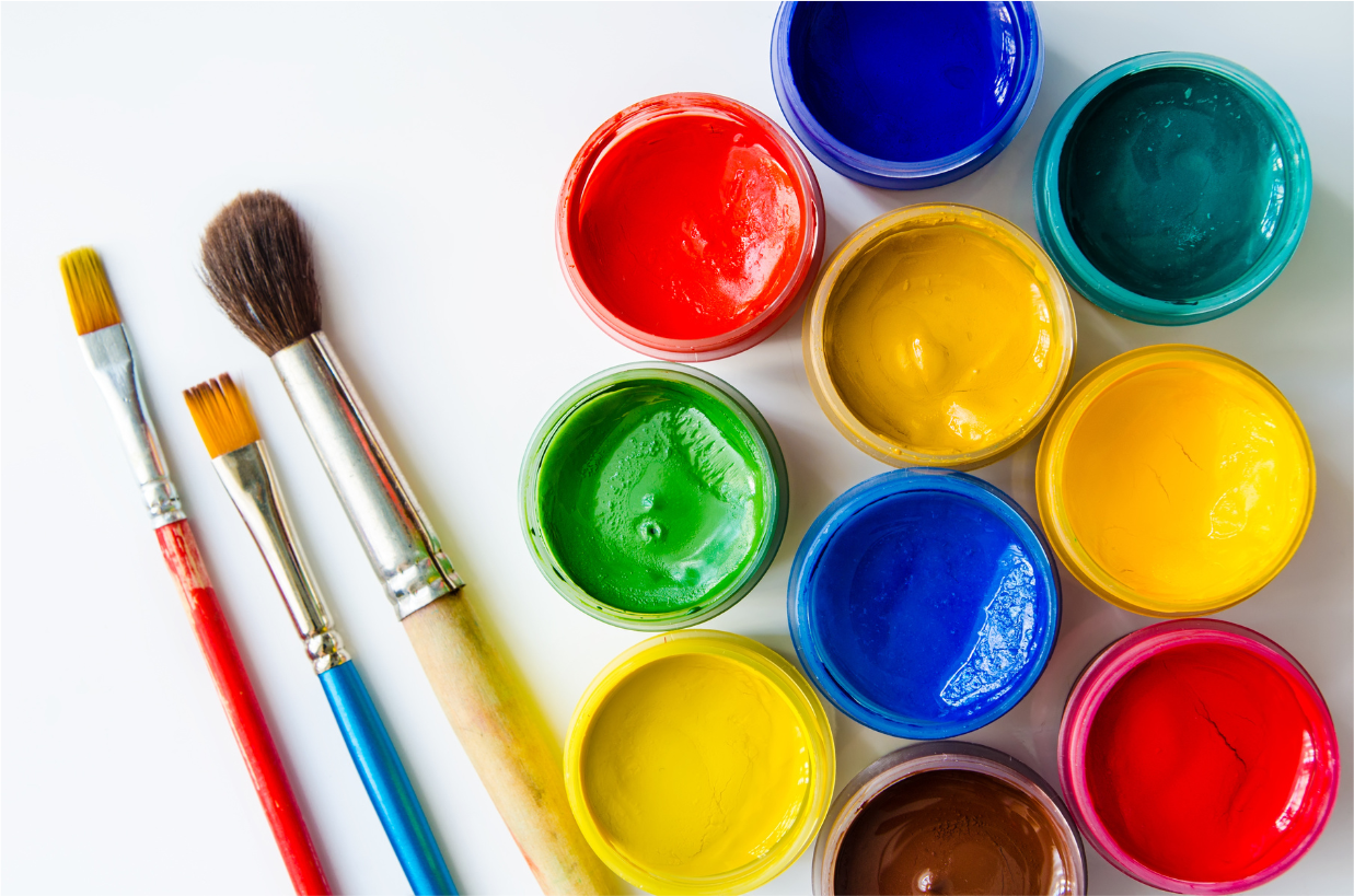 colorful paint and paintbrushes